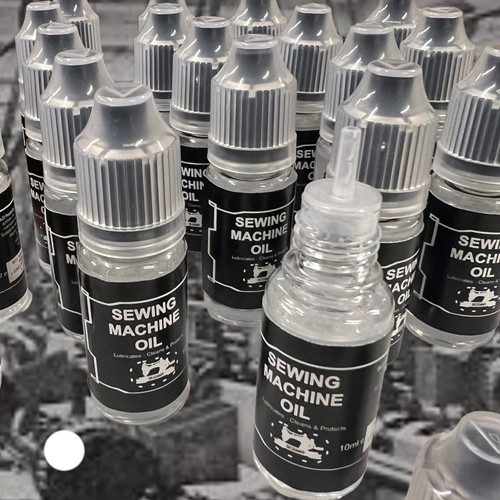 Sewing machine oil lubricant - machine,